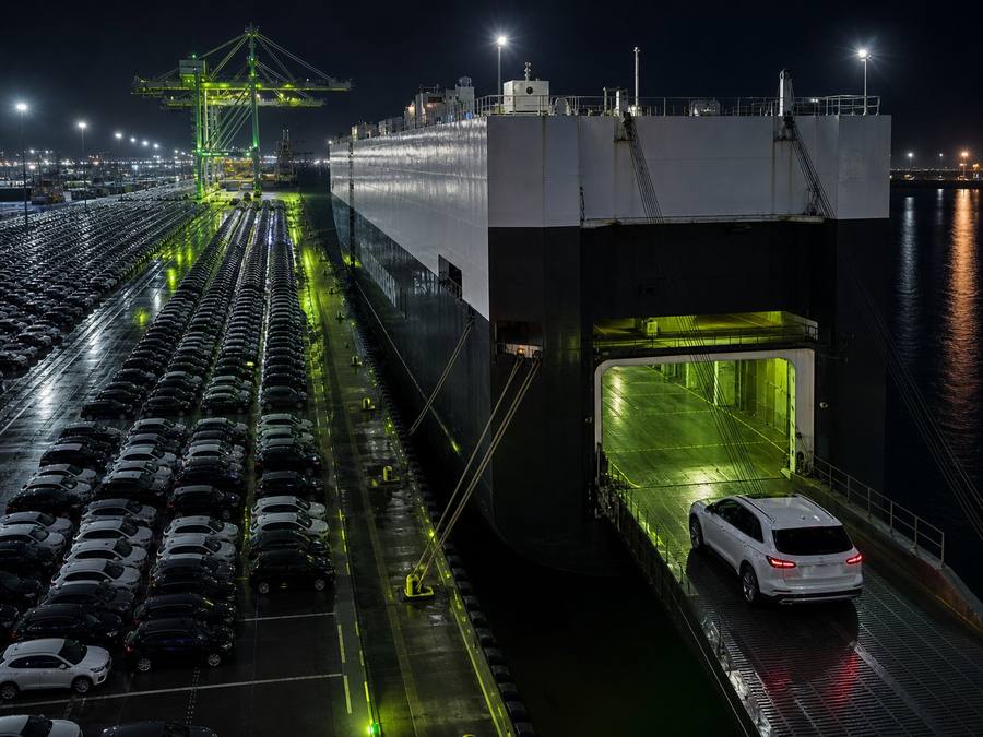 RoRo vehicle carrier loading imported cars at port for shipping to UAE